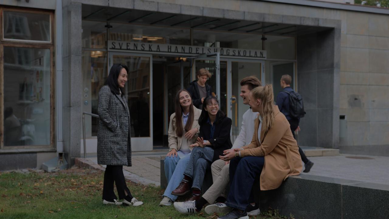 Students outside Hankens main building in Helsinki