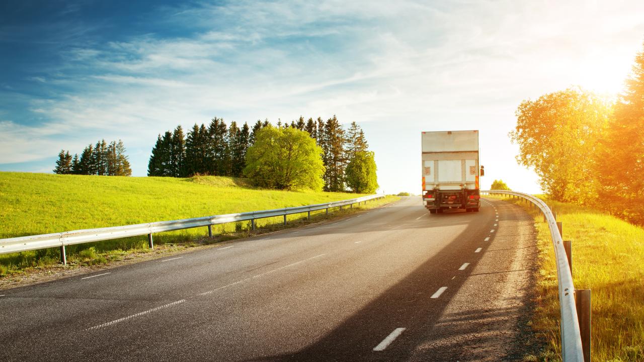 A truck driving on a road